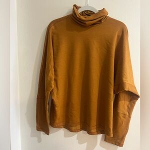 Lululemon Rust Orange Turtleneck batwing top